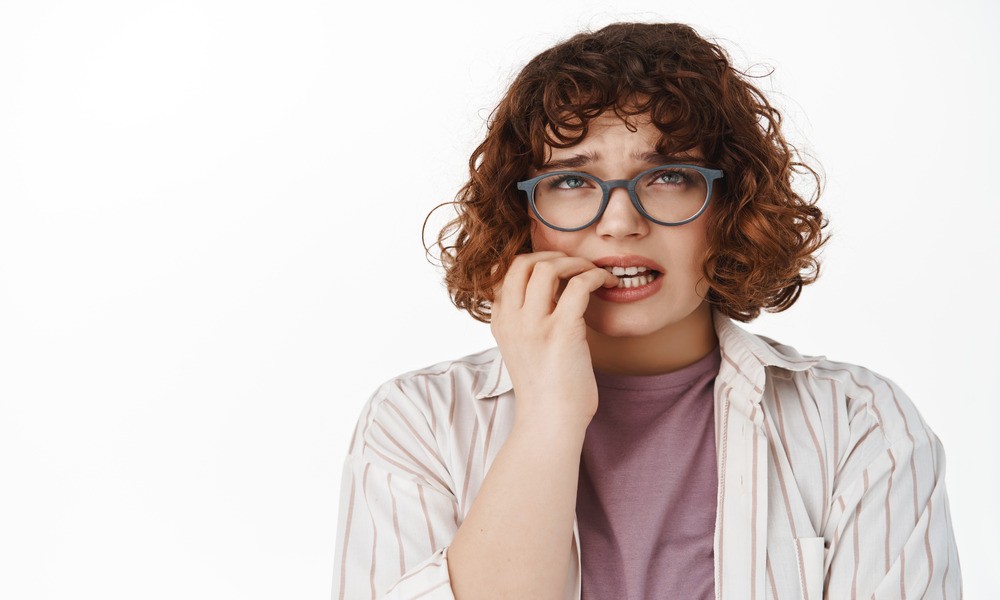 Scared woman experiencing dental anxiety at Meadowvale Family Dentistry